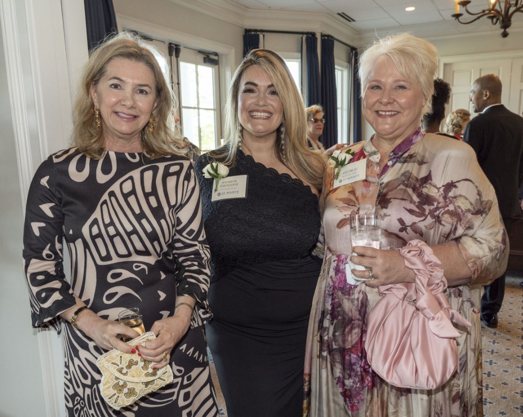 Three guests enjoying the 2026 St. Mary’s Celebration of Courageous Leaders Gala (Photo Credit: Wingate Downs)