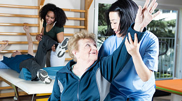 Physicians helping their patients exercise